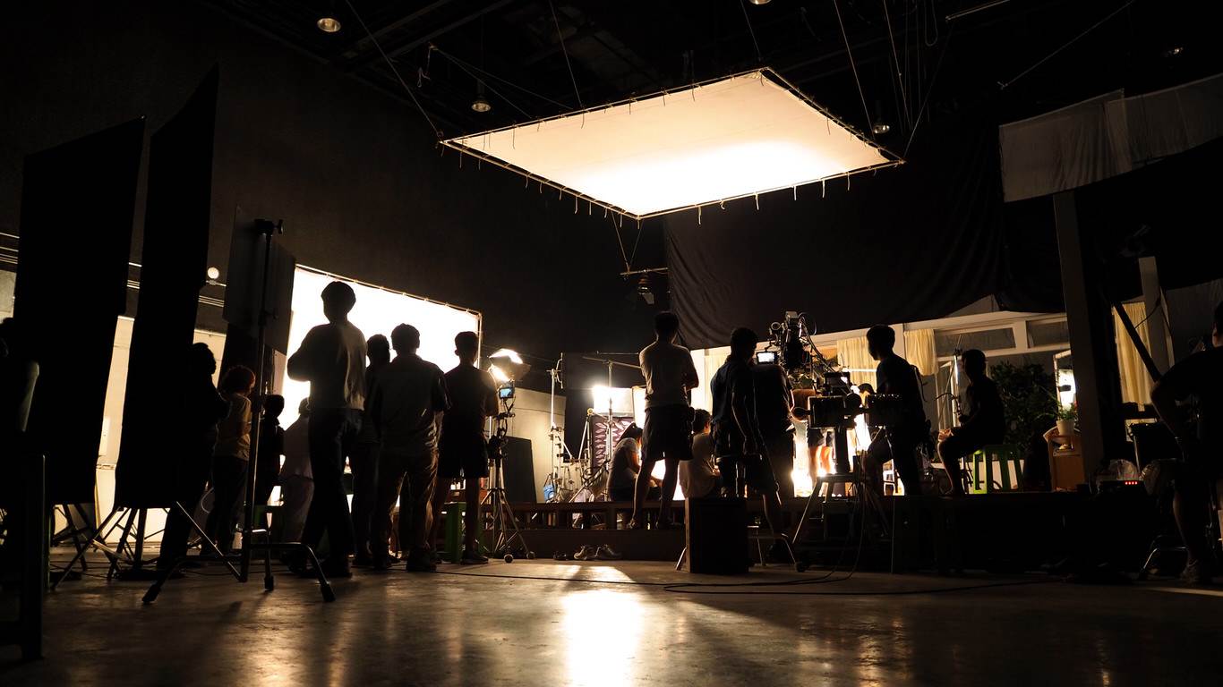 Behind the scenes of video production team silhouette